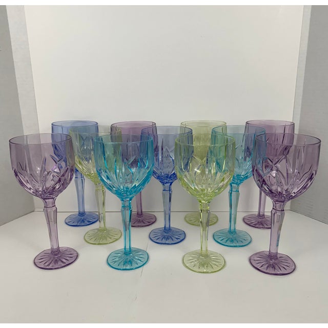 Waterford Marquis crystalline goblets in Brookside pattern. The colorful set includes four violet, three yellow...
