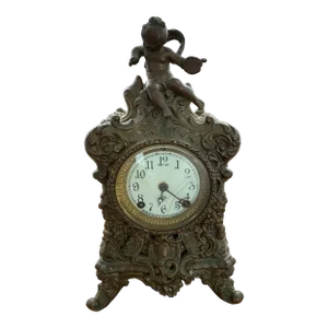 Early 20th Century Victorian Ansonia Bronze Clock With Cherub Pediment