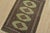 A tribal Bokhara Jaldar rug hand-knotted with fine wool on a cotton foundation. This rug features geometric medallions set...