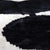 "A striking study in contrast and form, this handcrafted velvet pillow features bold black geometric shapes set against a...