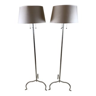 Chromed Iron Floor Lamps in the Style of Tommi Parzinger - a Pair For Sale