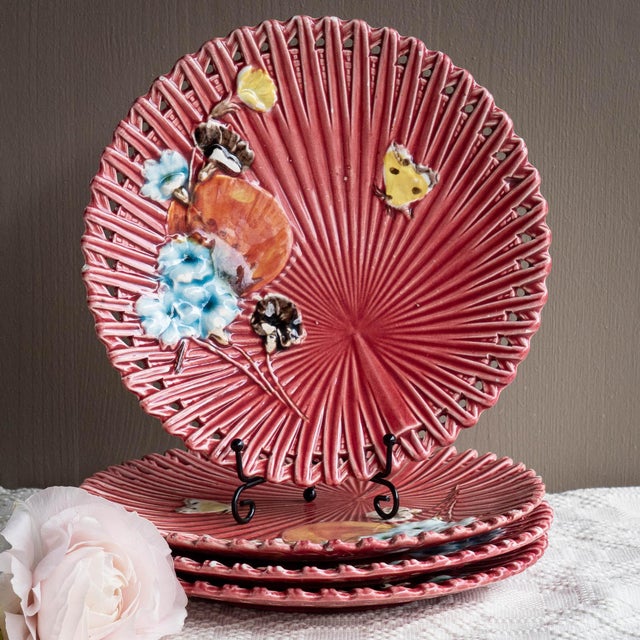 Experience the refined charm of this set of four antique majolica plates from SMF Schramberg, crafted in the 1920s. Their...