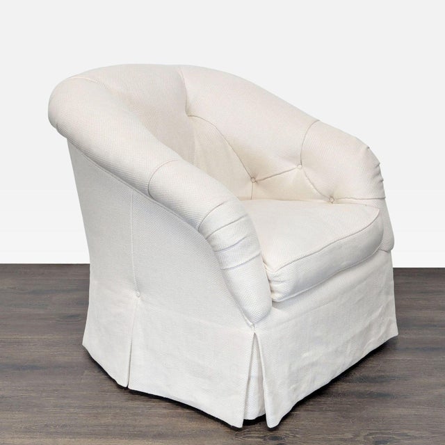 This Marco Fine Upholstered Furnishings swivel lounge chair features a soft cream color and a comfortable, cushioned seat....