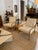 Pair of 1950s T.H. Robsjohn Gibbings armchairs, newly reupholstered in a striped linen fabric. These lounge chairs feature...