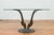 A contemporary bronze double antelope dining table base, top not included. Created with the traditional technique of the...