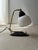 with smaller objects, design often matters most. This is certainly true for this table lamp from the 1950s. The base...