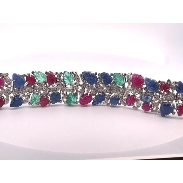 This is part of Chairish’s Fine Jewelry assortment. Tutti Frutti Bracelet 18K White Gold This Tutti Frutti Bracelet has...
