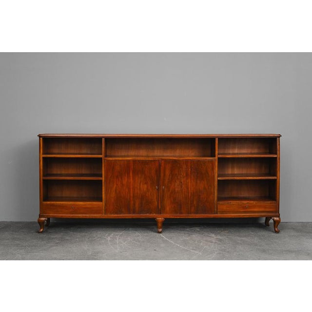 Item: Large bookcase/sideboard Period & Style: Art Nouveau - Early 20th Century Features: - Elegant and practical piece of...