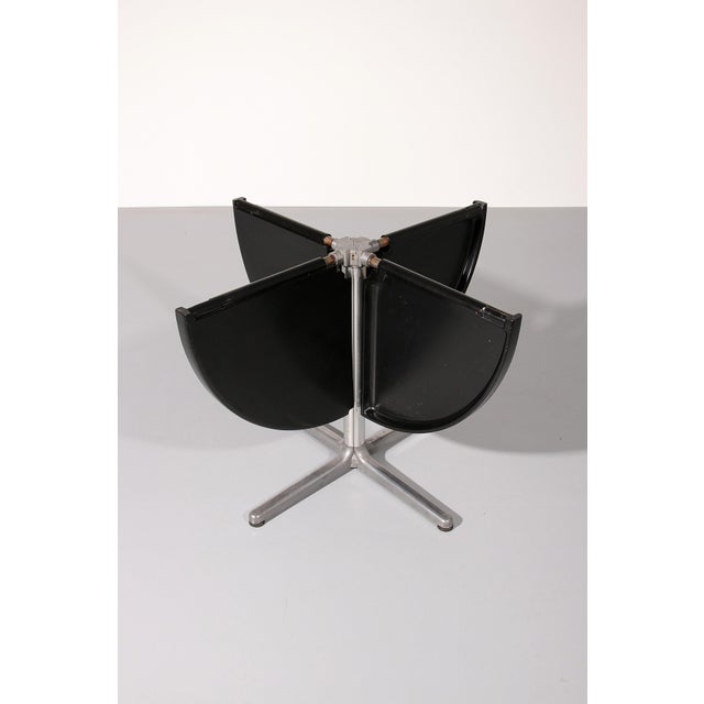 This exceptional dining game table is a striking example of Italian modern design from the 1970s, created by renowned...