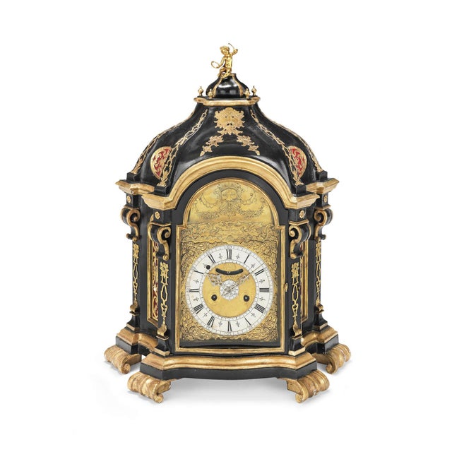 This imposing Roman clock is conceived as a miniature Baroque architecture, powerfully theatrical and rich in symbolic...
