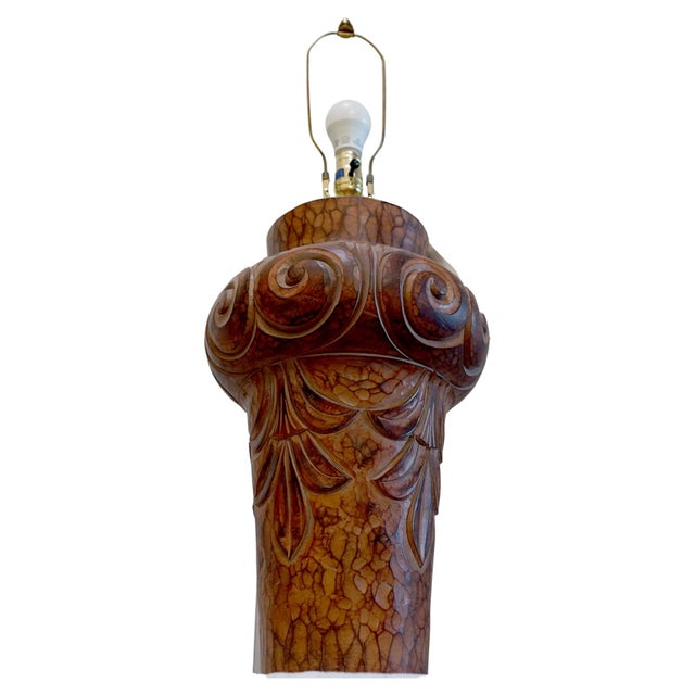 Warm terra cotta tones and beautiful sculpted pottery combine to make this monumental lamp great statement lighting. The...