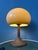 Vintage mushroom table lamp by the Dutch brand Herda. The mocca-coloured mushroom shade produces a nice and warm light....