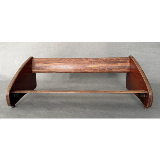 Wooden tabletop magazine rack, circa 1920 Magazine rack/stand, possibly of English origin Mahogany-stained beech wood...