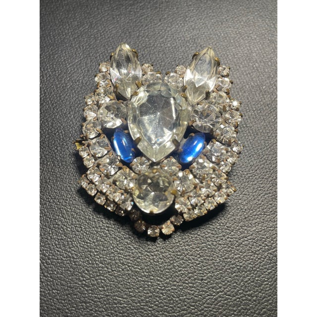 Vintage mid century brooch or sprite, animal face. Signed on the reverse side.