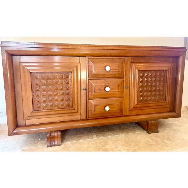 A Monumental Bridge Between Art Deco and Modernism. This architectural 1930s sideboard is a stunning example of the...