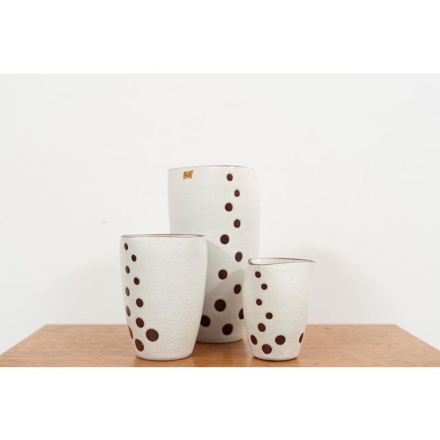 Vase set by Ravelli. This set comes with three vases with a dot pattern design. Dimensions small: 11 × 11 × 21cm...