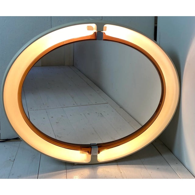 Authentic bathroom mirror Allibert from the 70’s. This mirror has a light-beige round resin body with a pivoting semi-...