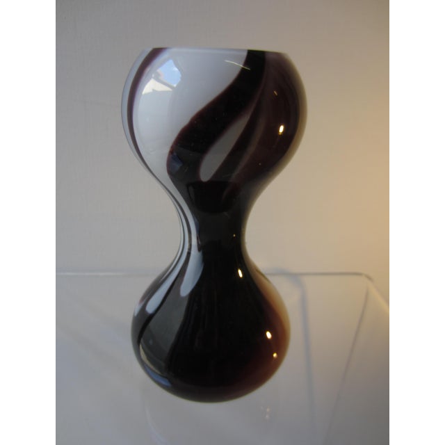 Beautifully shaped Murano glass vase by Carlo Moretti with an imaginative white and purple pattern, mouth-blown and...