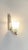 Art Deco glass and metal lamp made in France in the 1930s. The lamp has a metal stand and a frosted and cut glass diffuser...