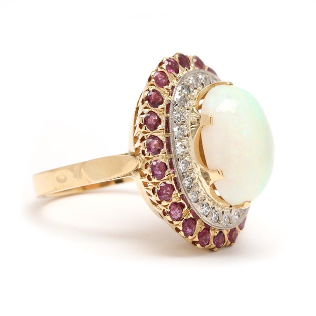 Stones: opal oval cab 14.3 x 10.6 mm diamond single cut round approximately .24 total carats G-H color, SI1-I1 clarity...