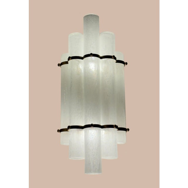 A refined expression of Italian Mid-Century design, this elegant pair of wall sconces is composed of five Pulegoso glass...