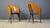 Gorgeous dining chairs with elegant metal and wooden frames and a black faux leather seat. The chairs are designed much in...