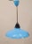 Ceiling pendant lacked lacquered metal in intense and black blue. A single light inside a circular screen, white on its...