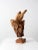 This is a mid-century organic wood sculpture on stand. Natural wood piece mounted on wooden stand with metal hardware.