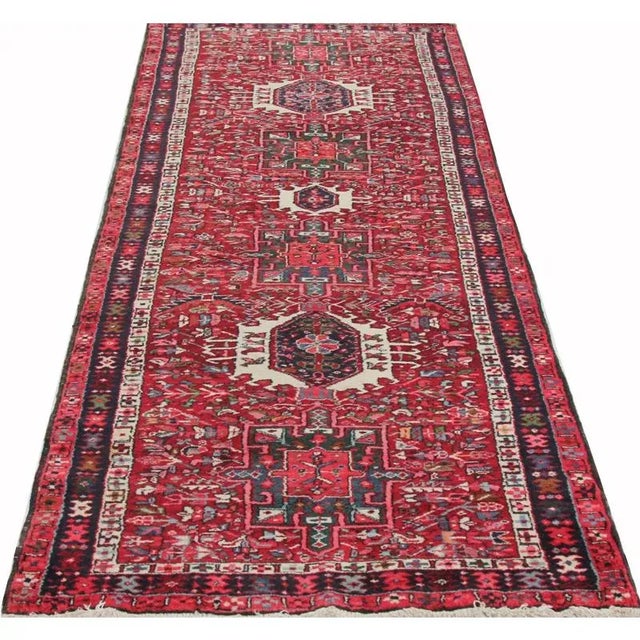 ACTUAL SIZE: 3’8″ x 10’1″ PRIMARY COLOR: Rust / Navy AGE: Old MATERIALS: Wool FOUNDATION: Cotton PRODUCTION: Handwoven,...