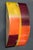 Vintage Italian wall light with curved Murano glass shade in yellow, orange and red colors, mounted on white metal frame /...