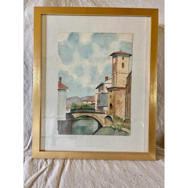 Found in the South of France, this beautiful Mid 20th Century Framed French Watercolor of St Jean Pied De Port was hand...