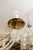 This chic chandelier was created in the 1970s. Its five arms and body are made from brass and Lucite and the materials...