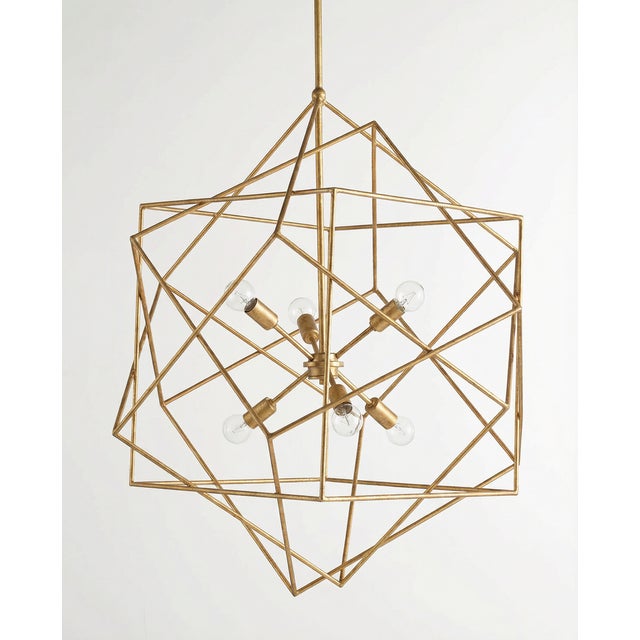 The Aerial Pendant Light by Currey & Company features a striking openwork design in a contemporary gold leaf finish. Airy...