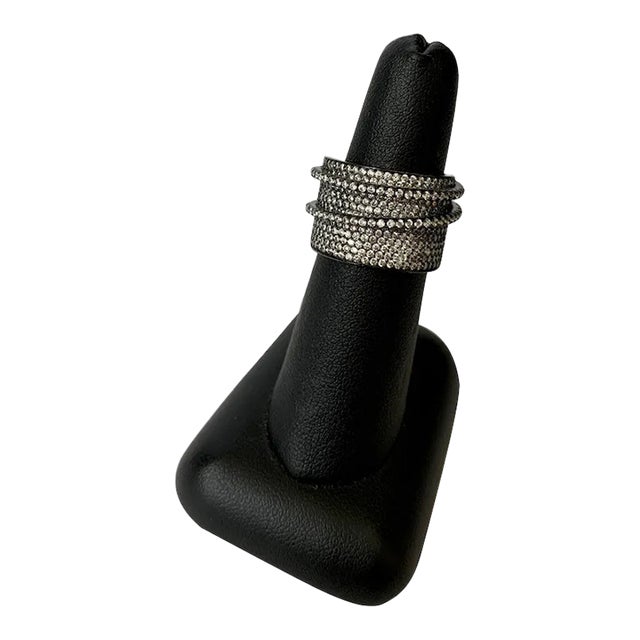 I need more fingers! I love this ring, it is a phenomenal design that will attract many compliments. Gunmetal colored...