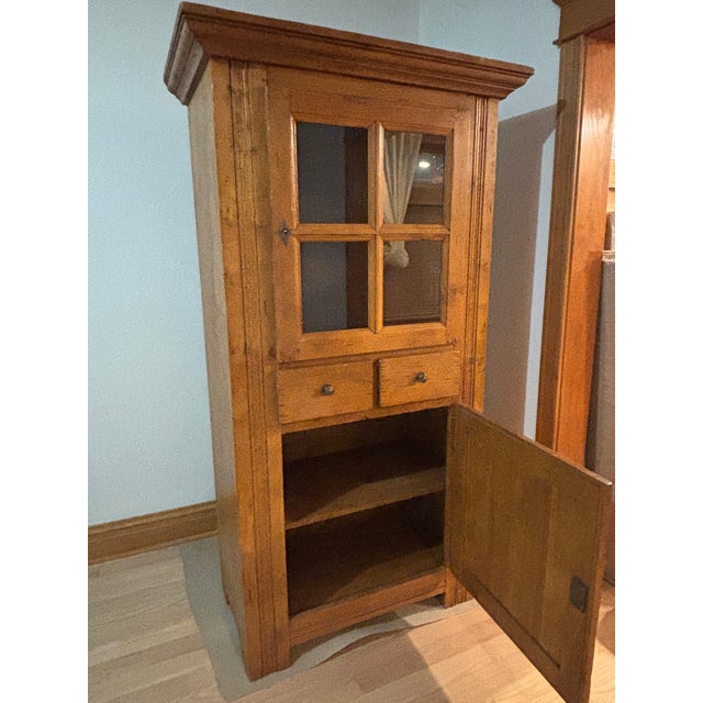 Rustic china hutch with tons of storage. Crystal displays nicely on top shelves and lower cabinet can accommodate a full...