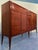 Magnificent Italian sideboard designed by Paolo Buffa in the 50s. Underlining the upper floor is wood veneer arranged in a...