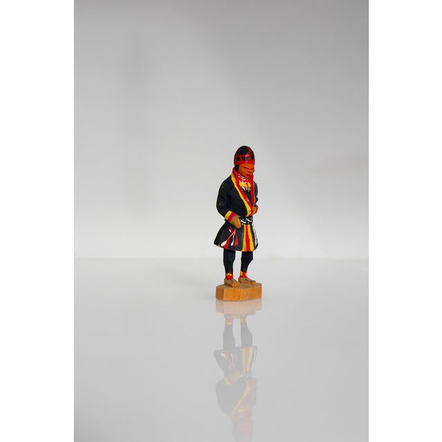 A beautifully crafted 1960s saami figure by the renowned swedish artist georg jonsson, presented in mint condition and...