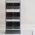 Anthracite metal rack with six open boxes in an industrial style. Suitable for structured storage in the kitchen,...