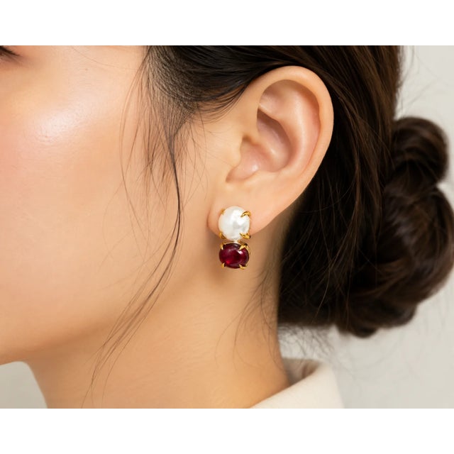 Elegant 14K yellow gold vermeil silver drop earrings featuring 2 natural cabochon rubies paired with 2 lustrous baroque...