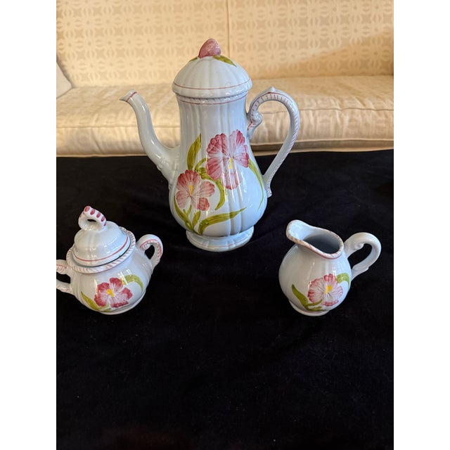 From Cantagalli Pottery in Florence, Italy, this hand painted Majolica earthenware set features the coffee pot, sugar and...