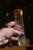 Traditional Antique Glass Vanity Bottle With Guilloché Enamel Monogrammed Cap For Sale - Image 3 of 4