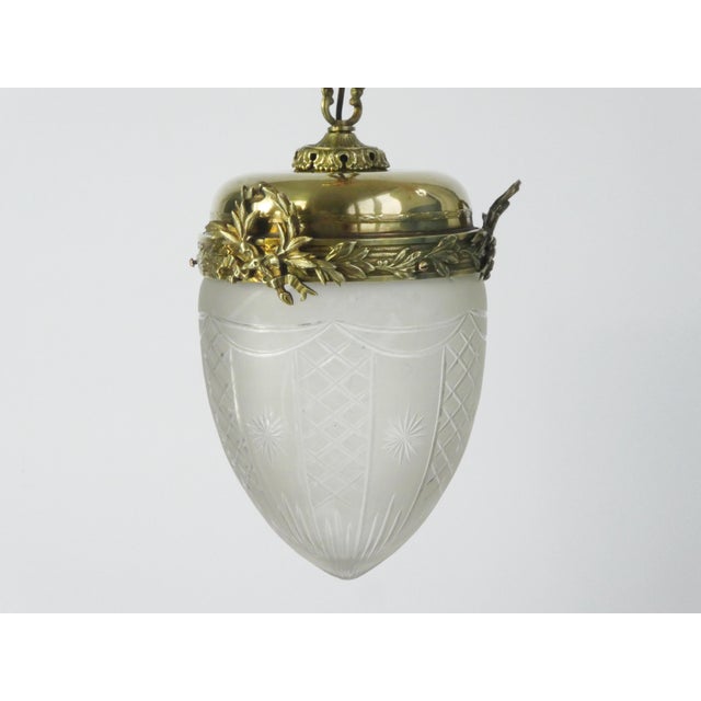 Antique French Art Nouveau Pendant Lamp in Crystal and Brass, in Very Good conditions. Designed 1920 to 1949 Up to 250V...