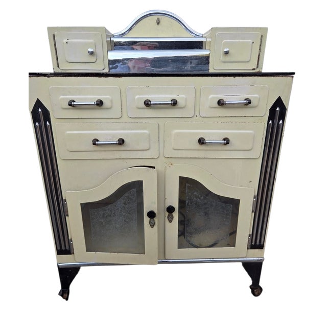 Awesome art deco doctors cabinet. Has age related ware. No key. the light works. the switch on side is disconnected. the...