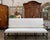 This beautiful long 20th Century French Os de Mouton walnut, Mutton leg, sofa is a timeless piece of French provincial...