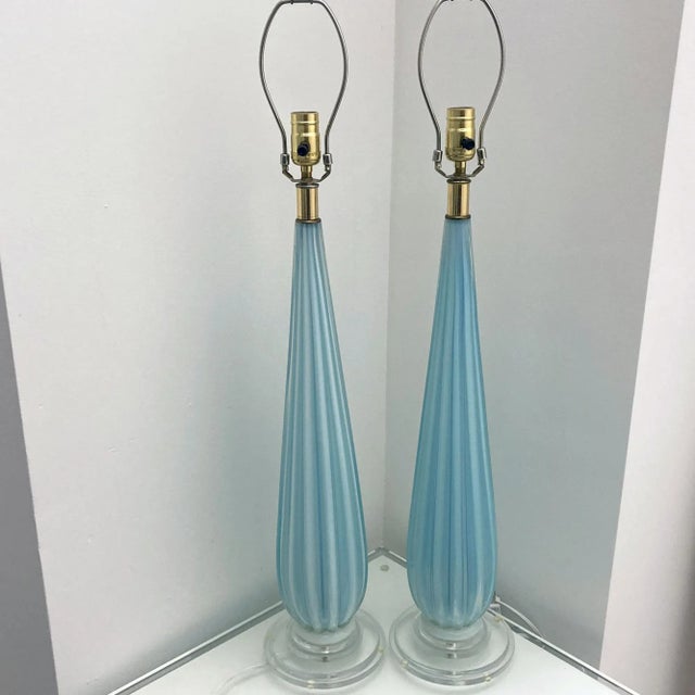 Pair of Blue Vintage Murano Glass Italian Blue Opalescent Table Lamps are rewired and rebuilt. The Murano glass part is...