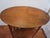 The beaded lunettes on this oval maple table are reminiscent of Moorish architecture; which the appraiser says was an...