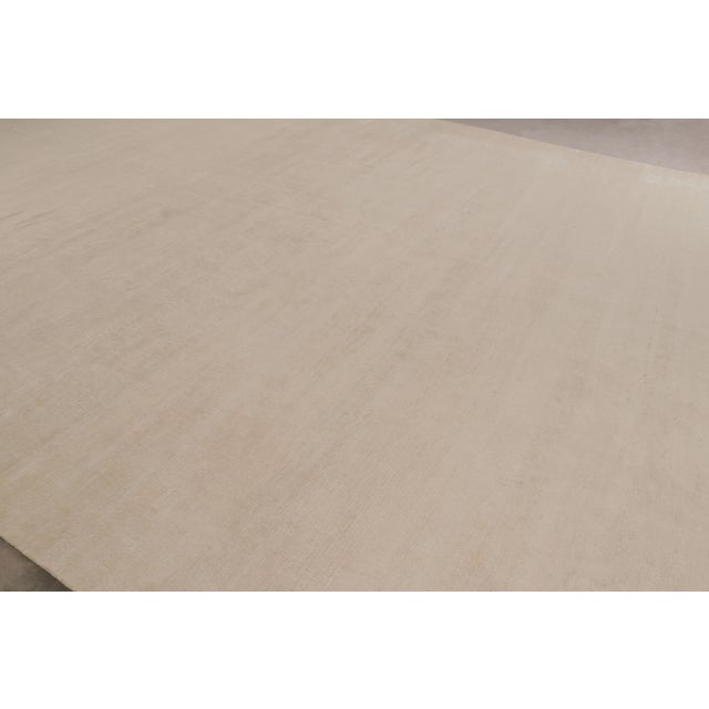 A 15x22 oversized bold new addition to our Texture of Color collection, made with hand-knotted sari silk and cotton. On...