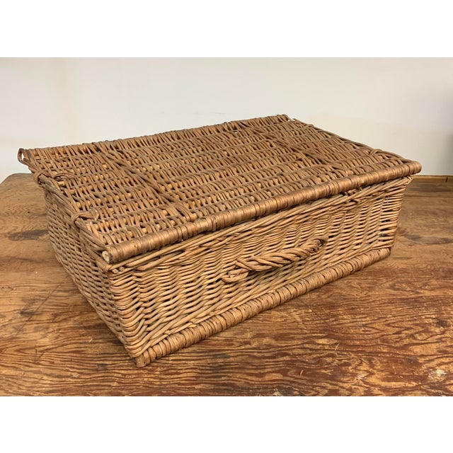 An older vintage handmade woven wicker willow branch basket with hinged hamper style lid. Great box form for organizing...