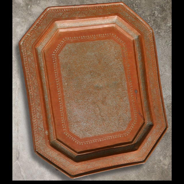 This octagonal copper sheet tray is distinguished by its magnificent warm copper hue and natural patina. The finely...