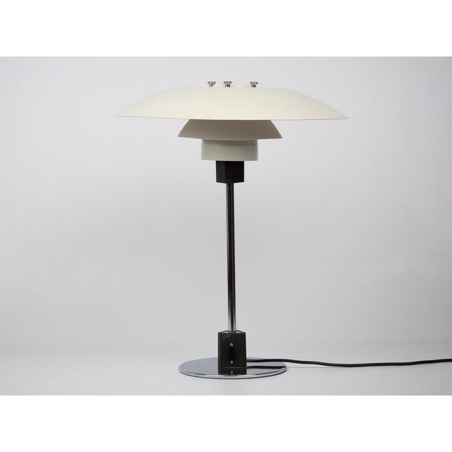 The ph 4/3 lamp is an absolute classic, designed by the renowned danish designer and architect poul henningsen. It has...